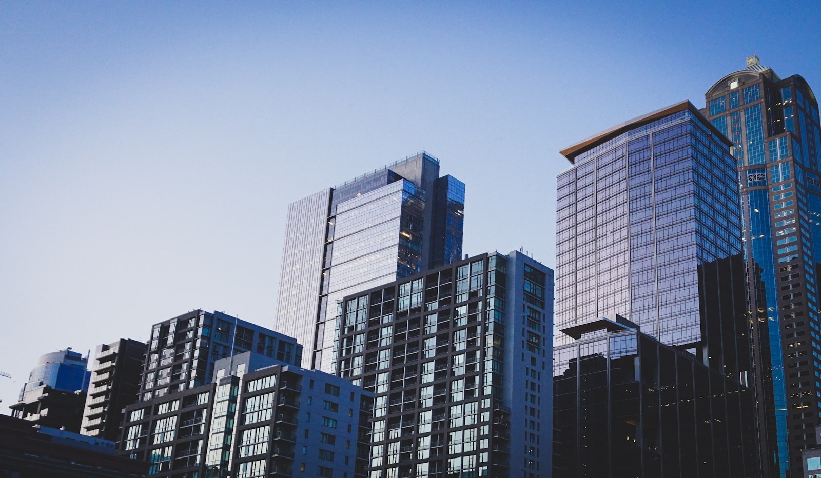 Modern high-rise residential building with reflective glass